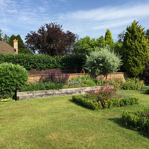 French style Garden Raised bed built using oak sleepers