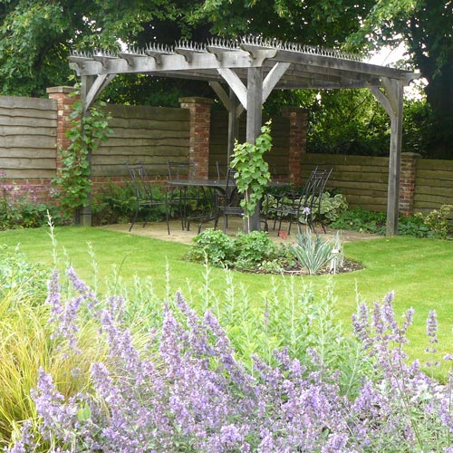 Modern Cottage Garden Oak-timber arbour with seating